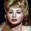 Suzanne Sybele as Derella