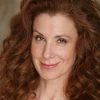 Suzie Plakson as Senior Flight Attendant