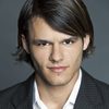 Justin Gerardin as Dev