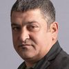 Dani Popescu as Premier Nazarbayevdx