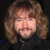 Justin Lee Collins as Uncle Stan