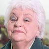 Rita May as Mrs. Kemp
