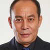 Zhang Guangbei as Chinese Ambassador