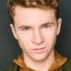 Justin Ellings as Travis
