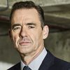 Richard Lintern as Bryan's Boss