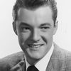 Mark Daniels as David V. Henderson