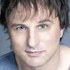 Troy MacKinder as Associate