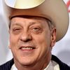 Junior Brown as Travis Osberger, the Wrong Texan