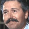 Paul Micale as Father Carmine (uncredited)