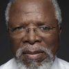 John Kani as Oliver Tambo