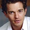 Dominic Allburn as Simon