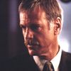 Nicolas Surovy as John