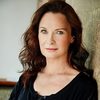Tara Morice as Lucinda Raine
