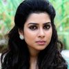 Satna Titus as Magizhini