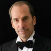 Lemmy Constantine as Neolite Marketing Executive