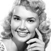 Yvonne Lime as Arlene Logan