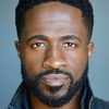 Chinedu Unaka as Sly