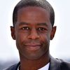 Adrian Lester as Wayne