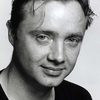 Paul Ronan as Man in Car