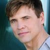 Brent Barrett as Brian the Set Designer