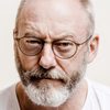 Liam Cunningham as Father Ray Connolly