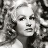 Julie Newmar as Angel