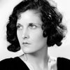 Evelyn Brent as Feathers