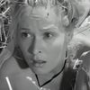 Irène Young as Marion