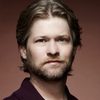Todd Lowe as Kelly