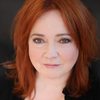 O-Lan Jones as Madame Debbie