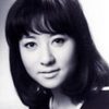 Reiko Kasahara as The Young Woman