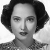 Merle Oberon as Leslie Calvin