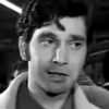 Vangelis Ploios as Man in the beach