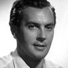 Brian Worth as District Commissioner Harcourt