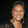 Dierdre Downing-Jackson as Business Woman on Plane