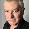 Michael Mili as Dimitri the Waiter
