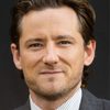 Lewis Pullman as Rocco