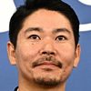 Hitoshi Omika as Magazine Editor