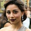 Amrita Puri as Megha