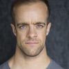 Jeremy Raymond as Waving Man