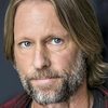 Rick Amsbury as Dennis