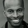 Denis Simpson as Abo Shaman / Choreographer