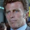 John Sullivan as 1st KGB Agent