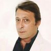 Christos Parlas as Dinos Varnezis
