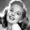 Nita Hunter as Caroler Lois Huggins (uncredited)