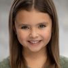 Mila Jones as Little Girl