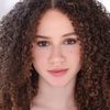 Chloe Coleman as Lou Gilbert