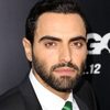 Farshad Farahat as Aziz