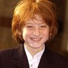 Raphaël Coleman as Chris Davis