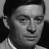 Jacques Doniol-Valcroze as Young Man at Café des Poètes (uncredited)